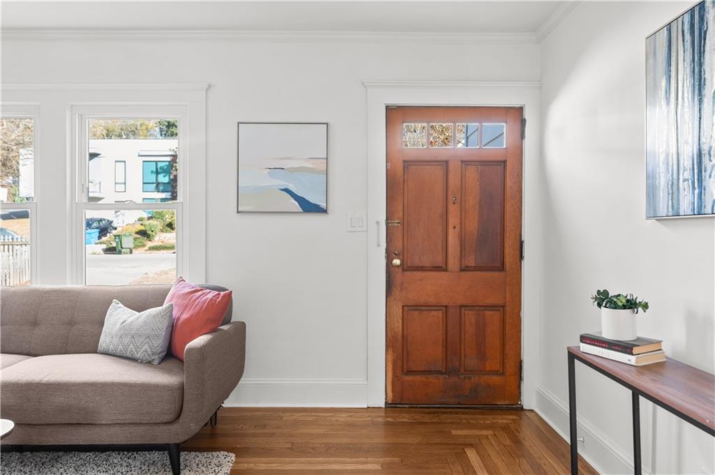 845 Ormewood Terrace Southeast, Unit A Atlanta, GA 30316 - Photo 23 of 34 a living room with furniture and wooden floor