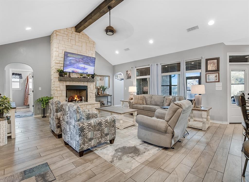 523 Mitchell Ryan Wake Village, TX 75501 - Photo 2 of 37 a living room with furniture and a fireplace