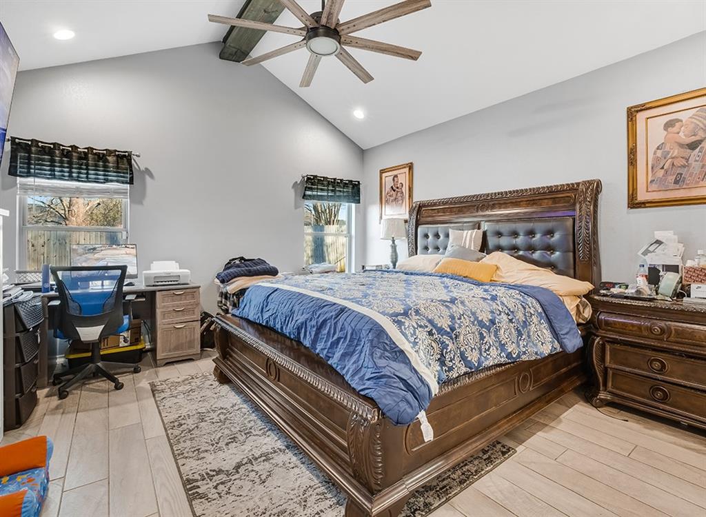 523 Mitchell Ryan Wake Village, TX 75501 - Photo 22 of 37 a bedroom with bed and wooden floor