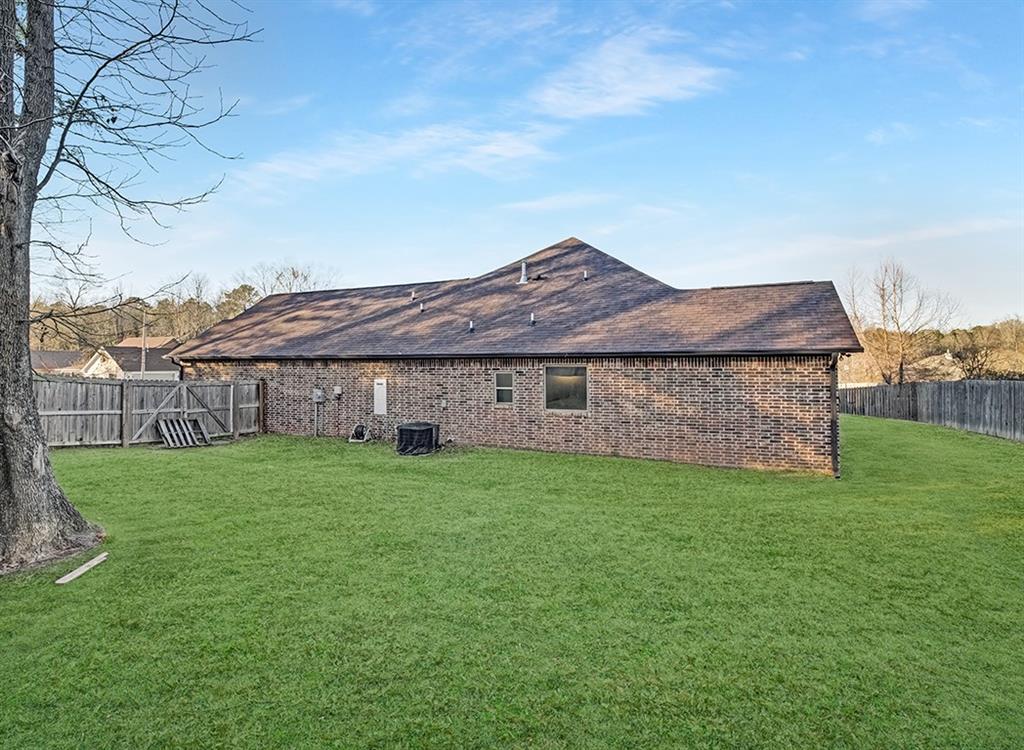 523 Mitchell Ryan Wake Village, TX 75501 - Photo 32 of 37 a view of a back yard of the house