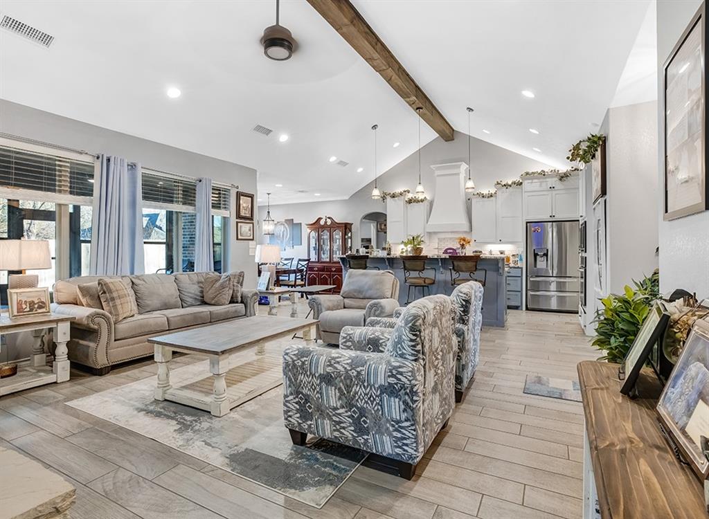 523 Mitchell Ryan Wake Village, TX 75501 - Photo 9 of 37 a living room with fireplace furniture and a potted plant