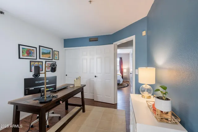 a view of a workspace with furniture