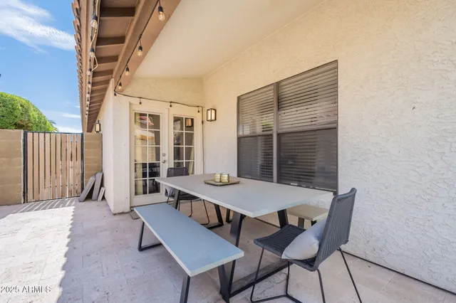 a view of a garden with couches