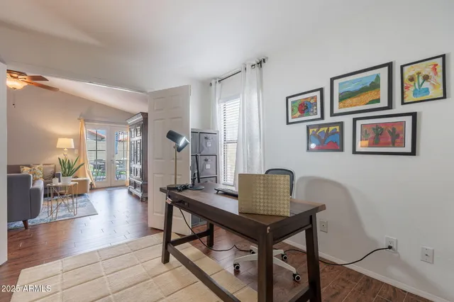 a workspace with furniture and window