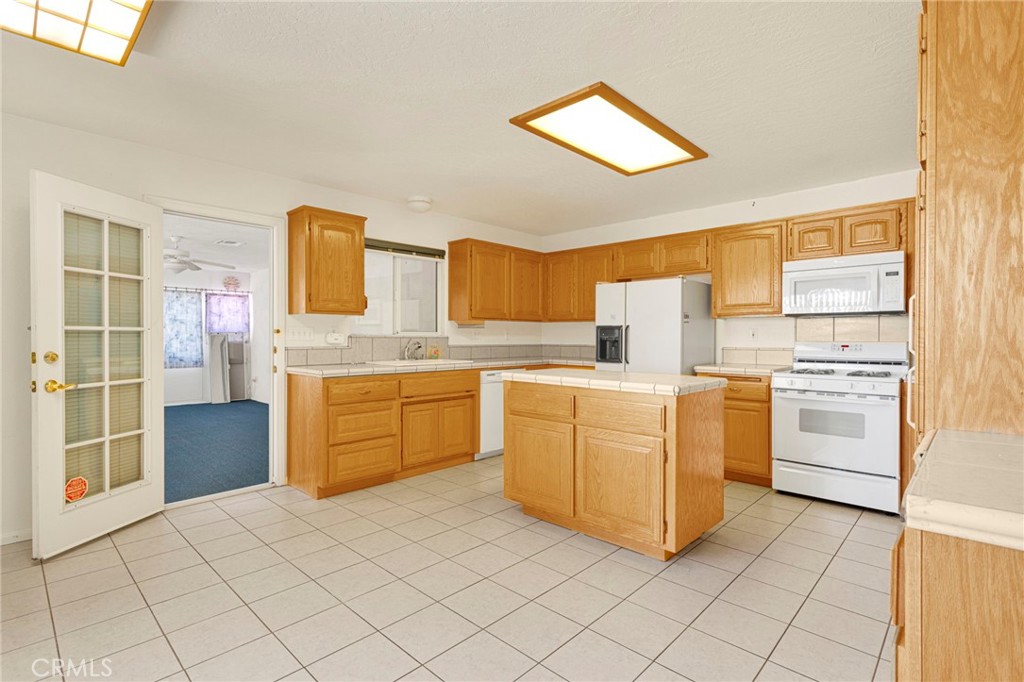 11281 4th Hesperia, CA 92345 - Photo 10 of 35 Large kitchen with tons of cabinets