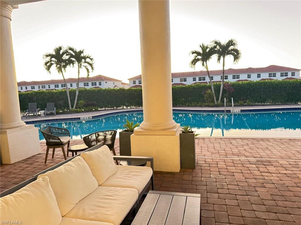 Undisclosed Address Naples, FL 34119 - Photo 19 of 20 a view of outdoor space with seating