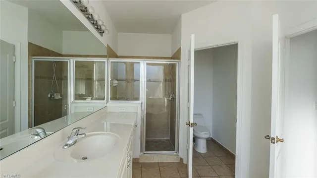 a bathroom with a tub and shower