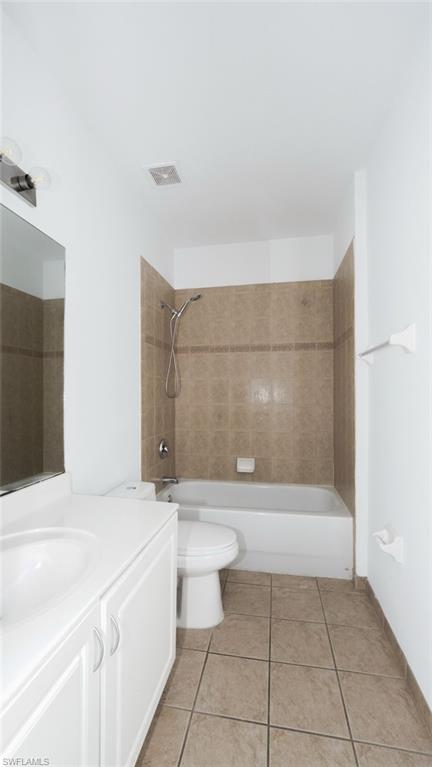 Undisclosed Address Naples, FL 34119 - Photo 8 of 20 a bathroom with a bathtub and toilet