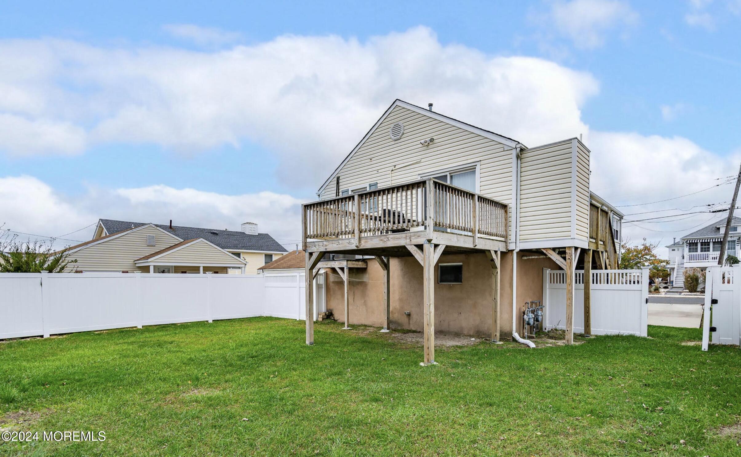 212 Randall Avenue Point Pleasant Beach, NJ 08742 - Photo 16 of 18 a view of a back yard of the house