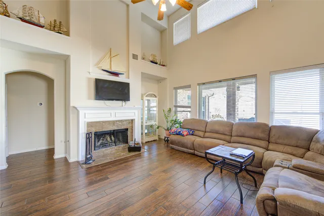a living room with furniture and a table