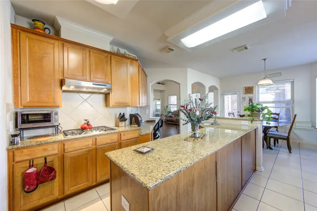 a bathroom with a sink vanity and a mirror