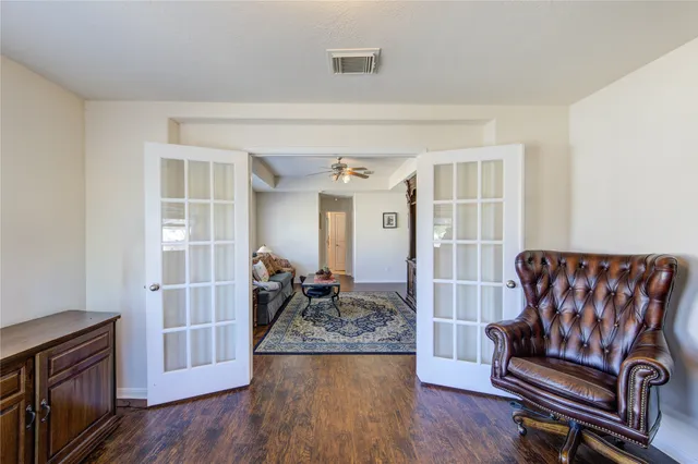 a bedroom with a bed and a fireplace