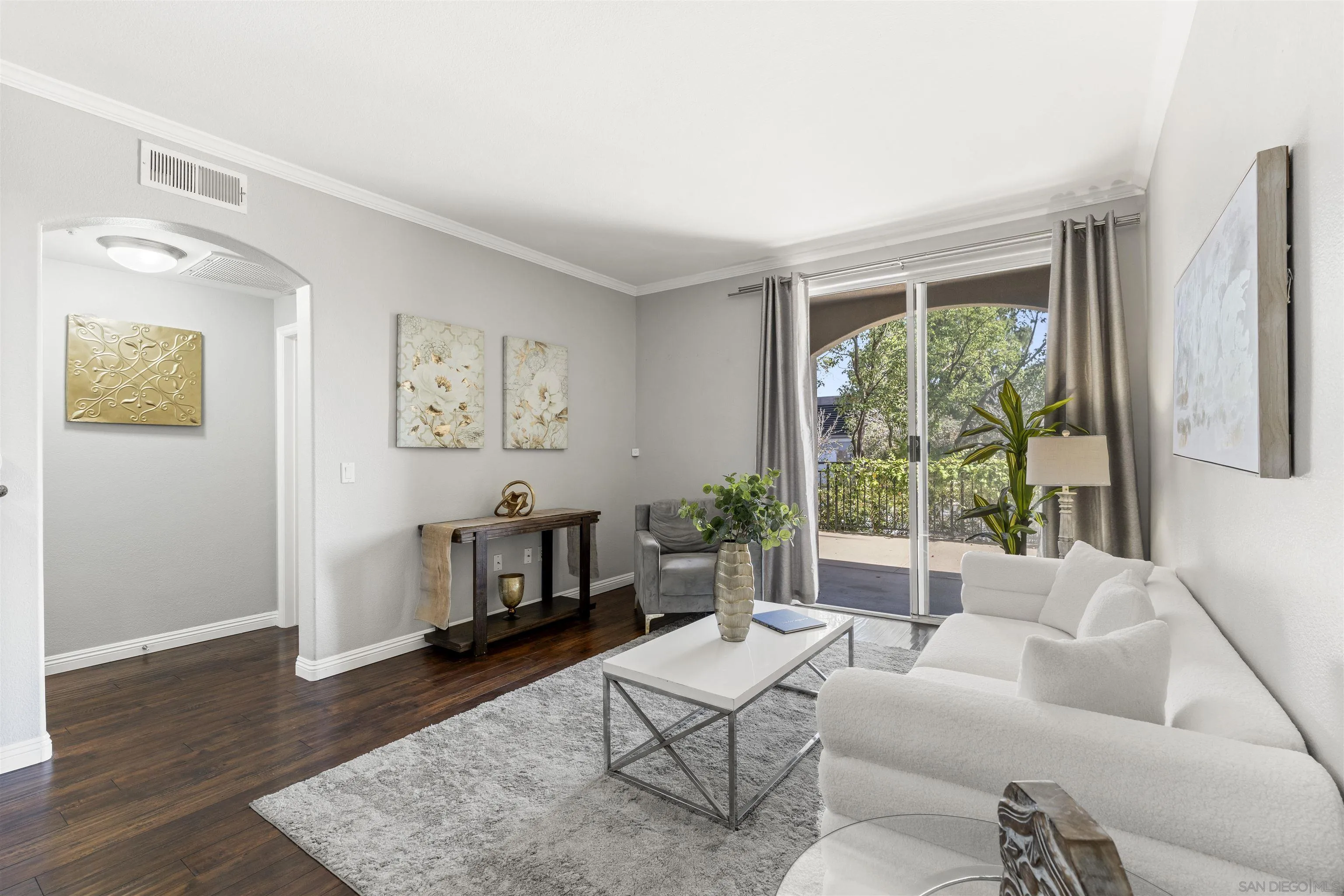 Enjoy the ease of single level, ground-floor living of this 2BR + office end unit residence. Absolutely no stairs or elevators needed to reach your front door.