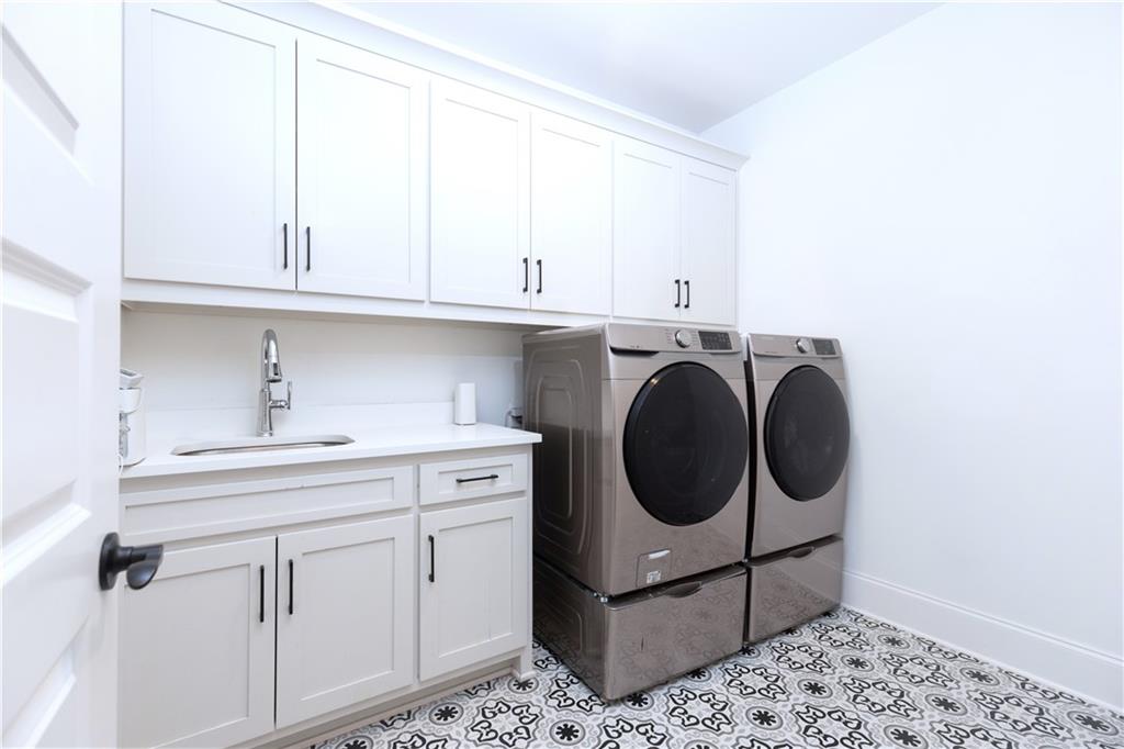 155 Dean Drive Tyrone, GA 30290 - Photo 12 of 50 a utility room with sink dryer and washer