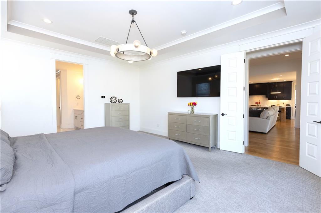 155 Dean Drive Tyrone, GA 30290 - Photo 15 of 50 a bedroom with a bed and a flat screen tv