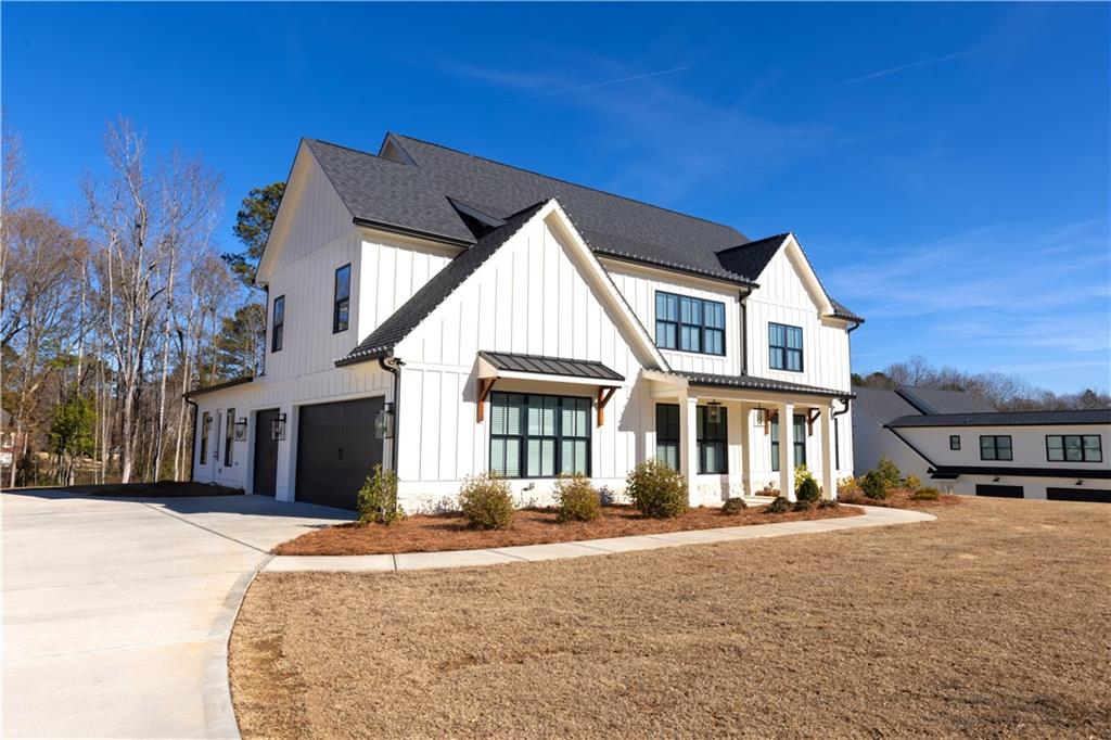155 Dean Drive Tyrone, GA 30290 - Photo 2 of 50 a front view of a house with a yard