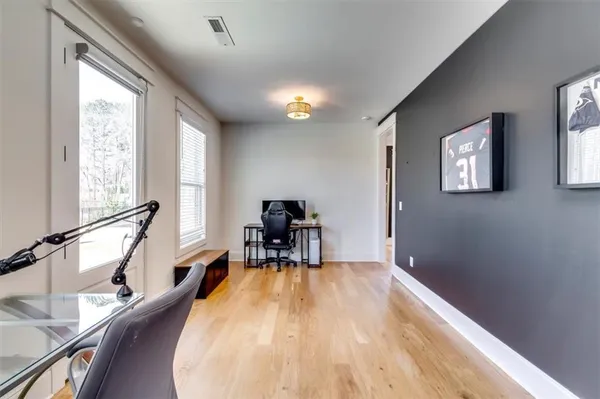 a room with furniture and a book shelf