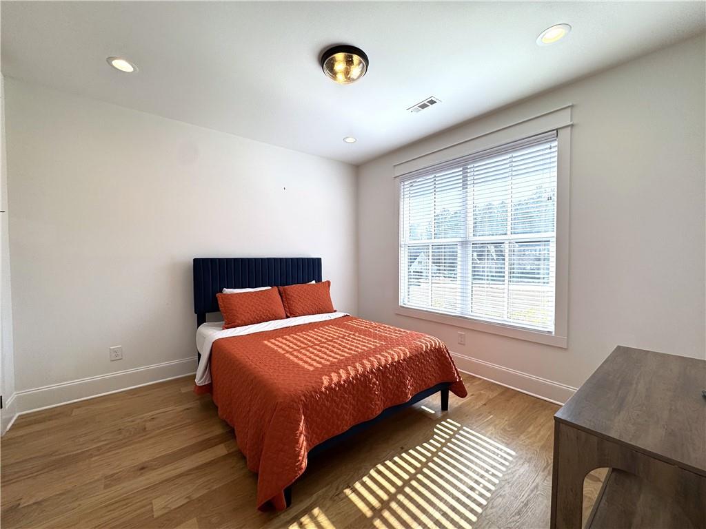 155 Dean Drive Tyrone, GA 30290 - Photo 23 of 50 a bedroom with a bed and a window