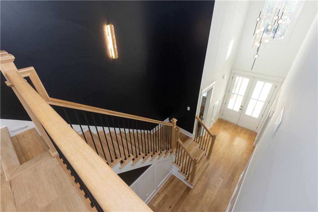 155 Dean Drive Tyrone, GA 30290 - Photo 24 of 50 a view of a staircase with wooden floor and stairs