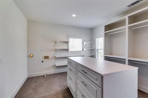 a view of swimming pool with outdoor seating