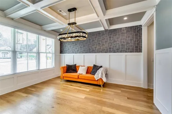 a living room with furniture and a window