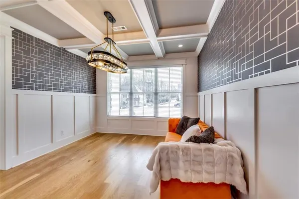 a bed room with a bed and a window