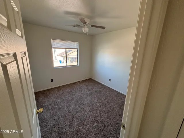 a view of a window in an empty room