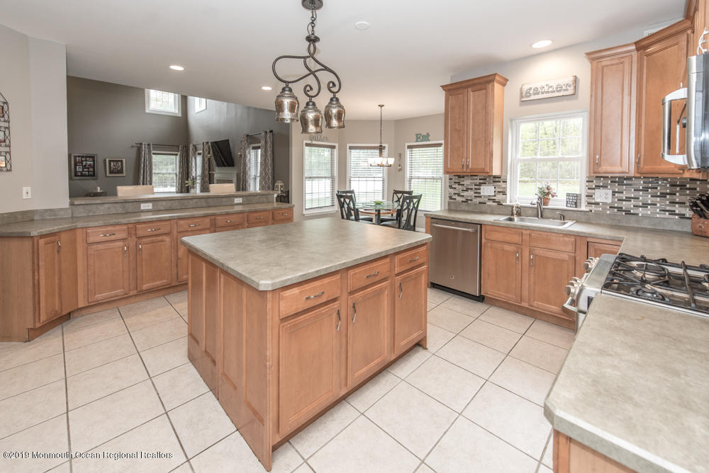 11 Round Hill Road Jackson, NJ 08527 - Photo 26 of 69 a kitchen with stainless steel appliances granite countertop a sink counter space cabinets and a counter top space