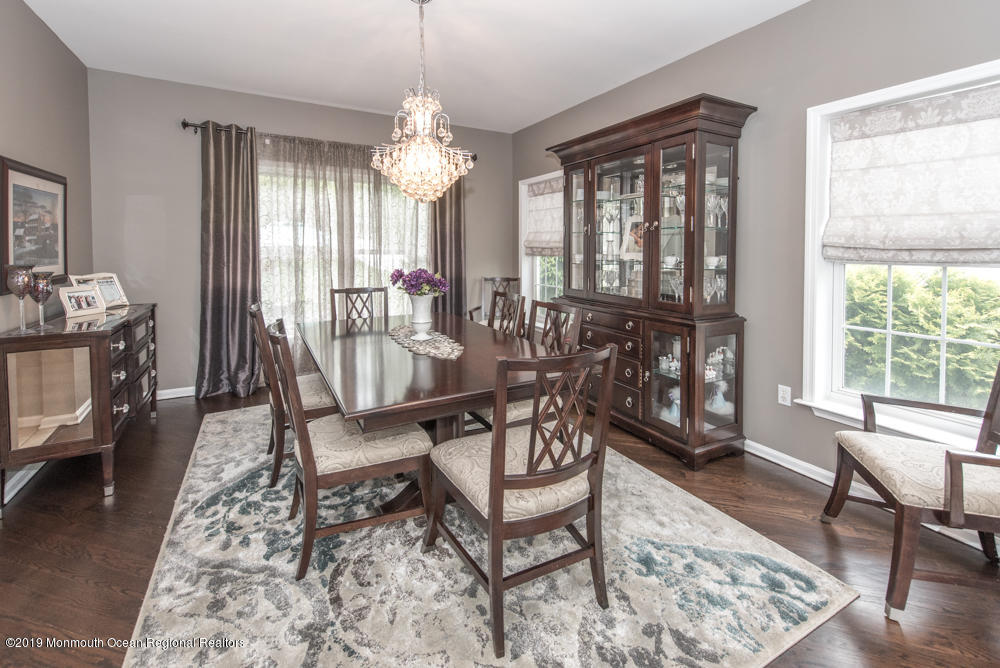 11 Round Hill Road Jackson, NJ 08527 - Photo 34 of 69 a view of a dining room with furniture window and wooden floor