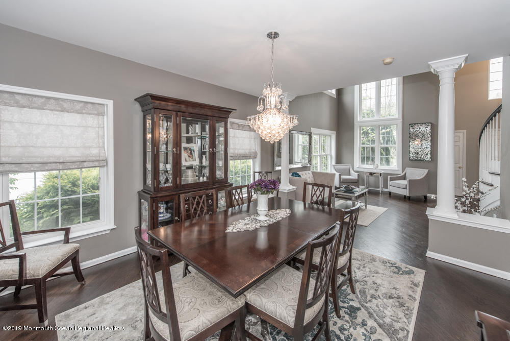 11 Round Hill Road Jackson, NJ 08527 - Photo 35 of 69 a view of a dining room with furniture window and wooden floor