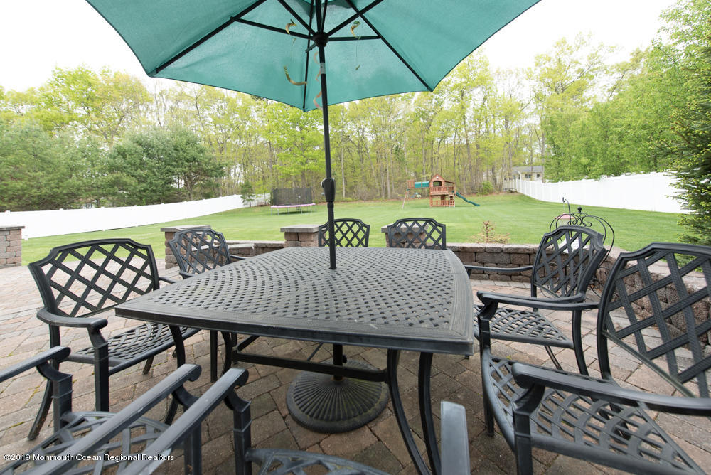 11 Round Hill Road Jackson, NJ 08527 - Photo 68 of 69 a view of an outdoor sitting area with furniture and backyard