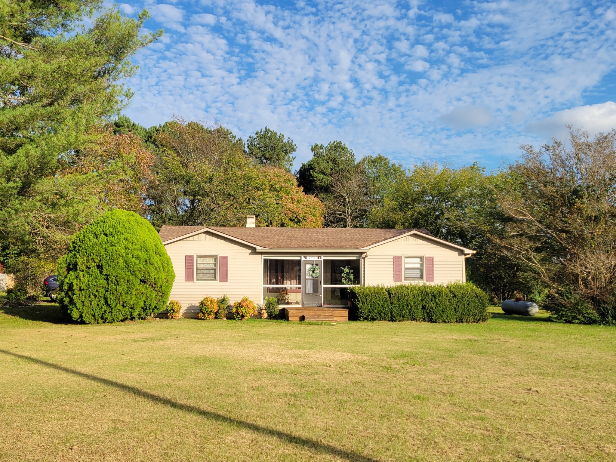 2992 Gum Creek Road Decherd, TN 37324 - Photo 1 of 25 a front view of a house with a yard and trees