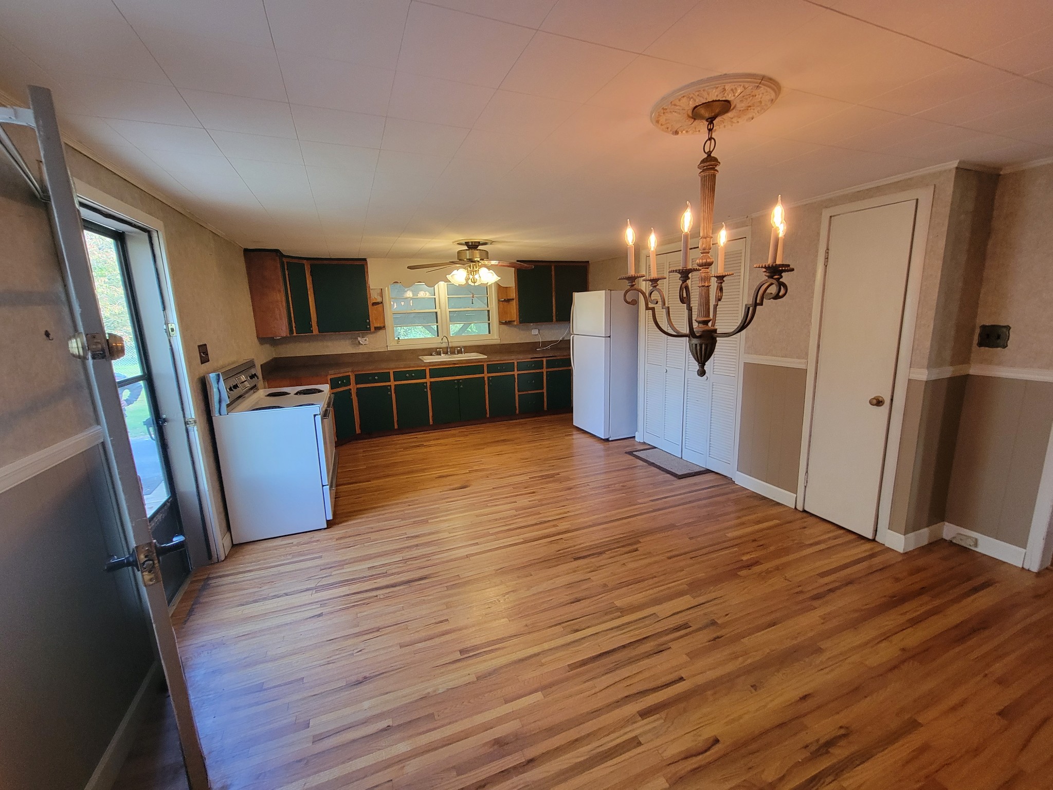 2992 Gum Creek Road Decherd, TN 37324 - Photo 12 of 25 a view of a livingroom with furniture wooden floor and staircase