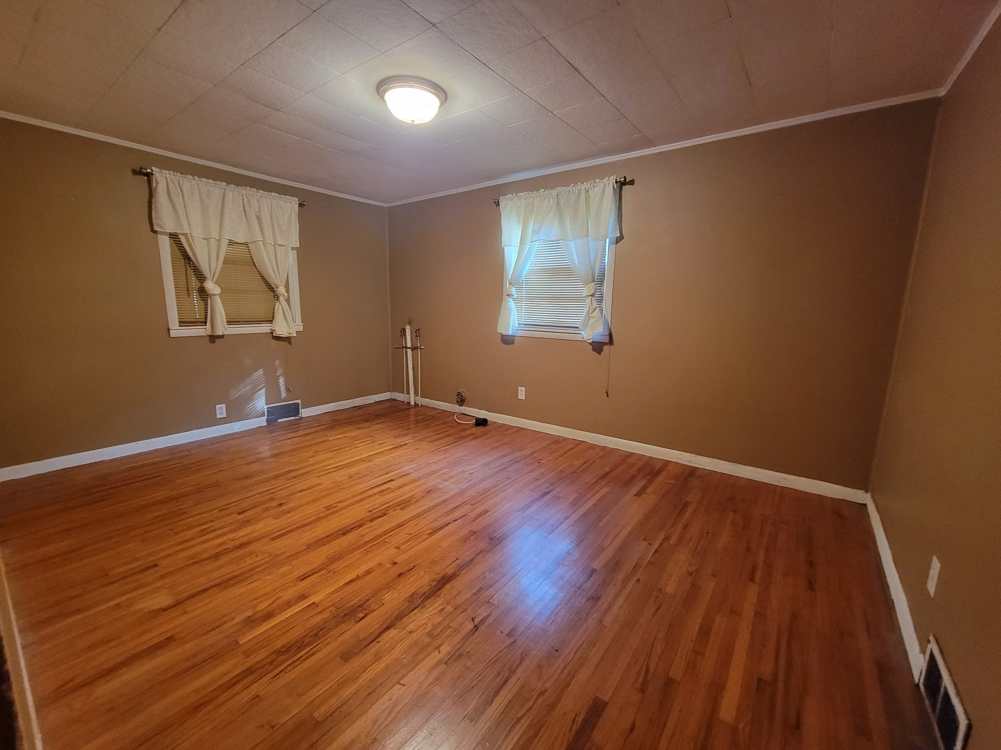 2992 Gum Creek Road Decherd, TN 37324 - Photo 17 of 25 a view of room with wooden floor and window