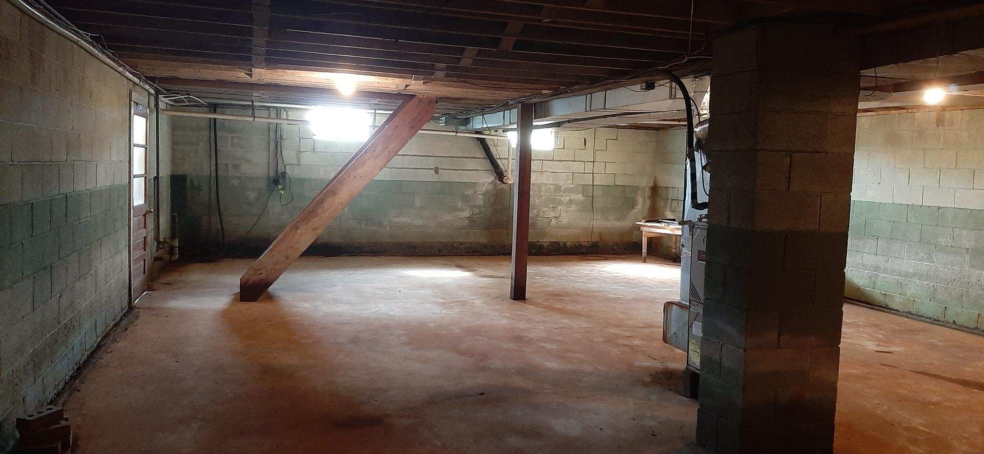 2992 Gum Creek Road Decherd, TN 37324 - Photo 20 of 25 a view of an empty room with wooden floor