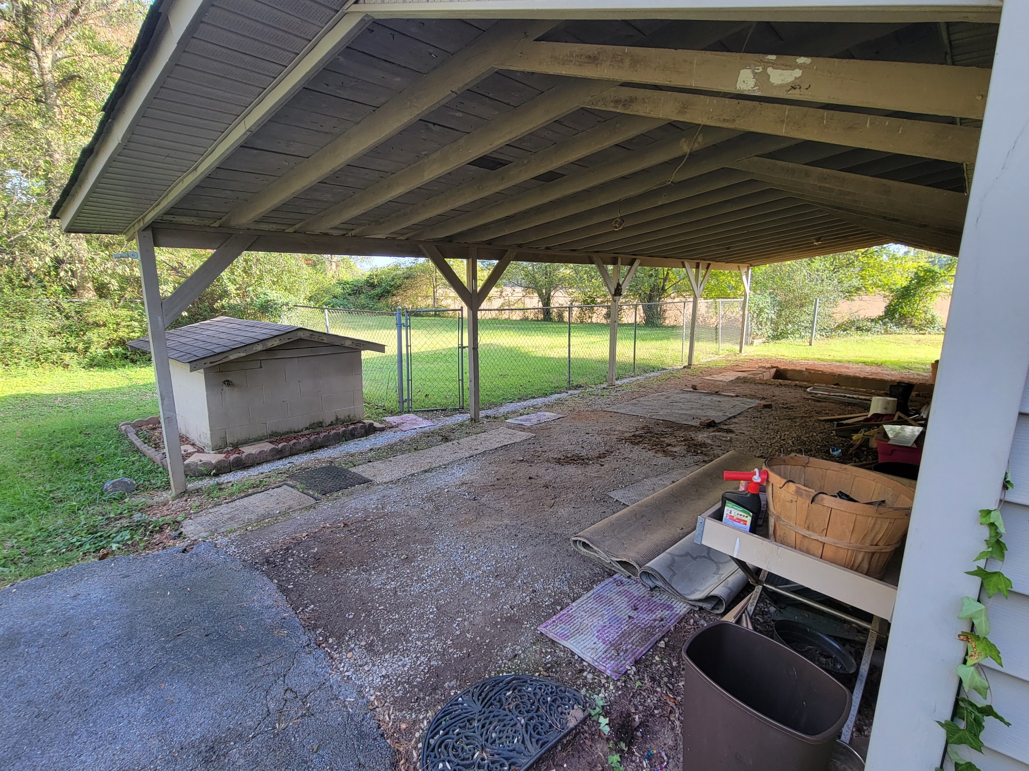 2992 Gum Creek Road Decherd, TN 37324 - Photo 23 of 25 a view of a backyard with plants and a patio