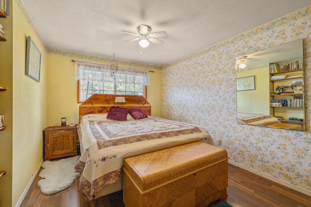 47477 Gerber Road Bonanza, OR 97623 - Photo 63 of 63 a bed sitting in a bedroom next to a window