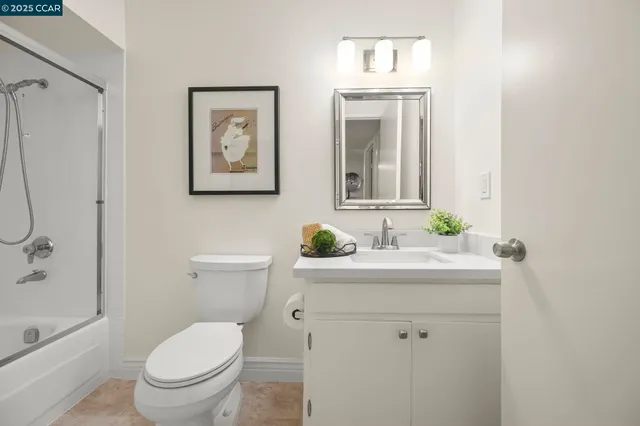 a bathroom with a toilet a sink and a bathtub