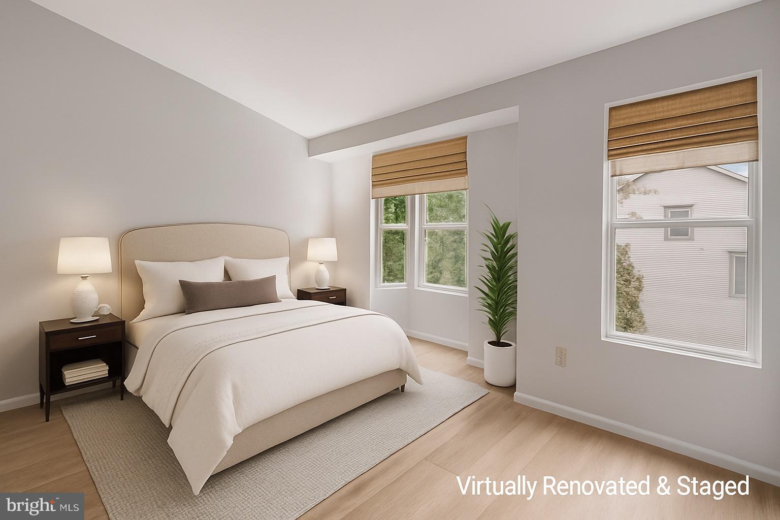 2890 Schoolhouse Circle Silver Spring, MD 20902 - Photo 12 of 23 a bedroom with a large bed and a window