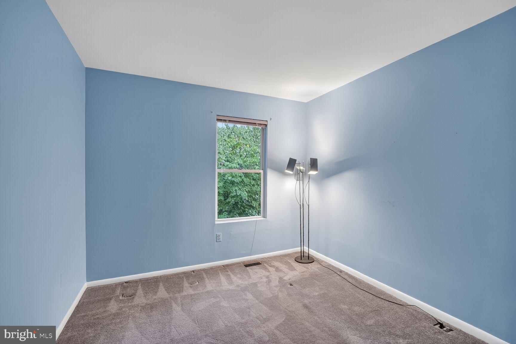2890 Schoolhouse Circle Silver Spring, MD 20902 - Photo 16 of 23 an empty room with windows