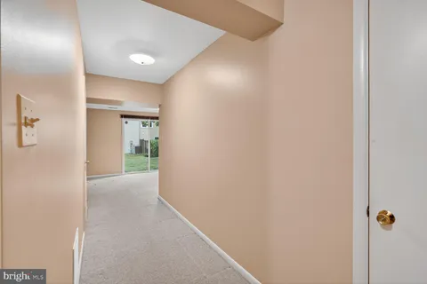 a view of a room with a large window