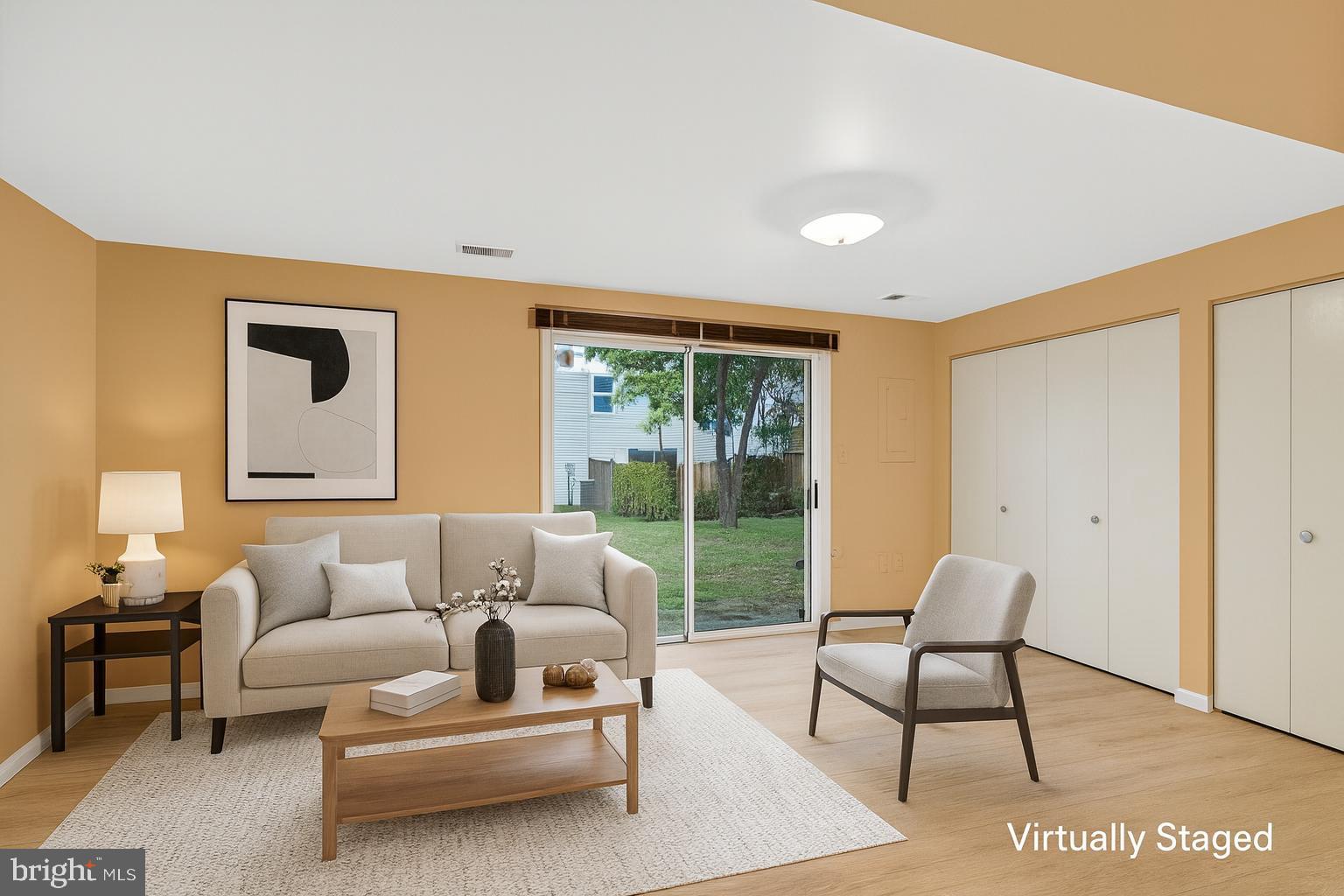 2890 Schoolhouse Circle Silver Spring, MD 20902 - Photo 19 of 23 a living room with furniture and a large window