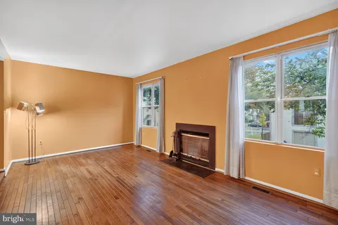 a view of empty room with red walls