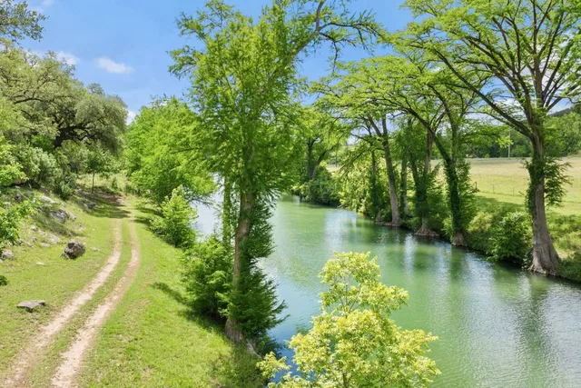 a view of a lake view with a garden