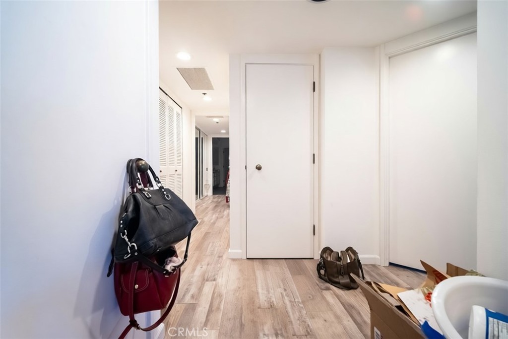 222 Monterey Road, Unit 206 Glendale, CA 91206 - Photo 10 of 22 a view of walk in closet with clothes and shoes