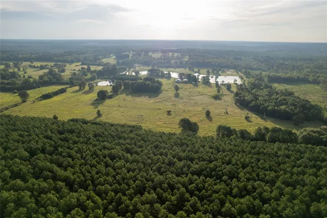 an aerial view of residential building with outdoor space