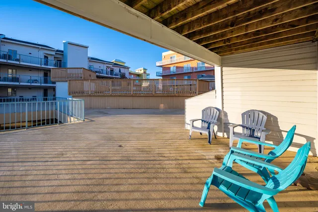a view of a chairs and table in the patio