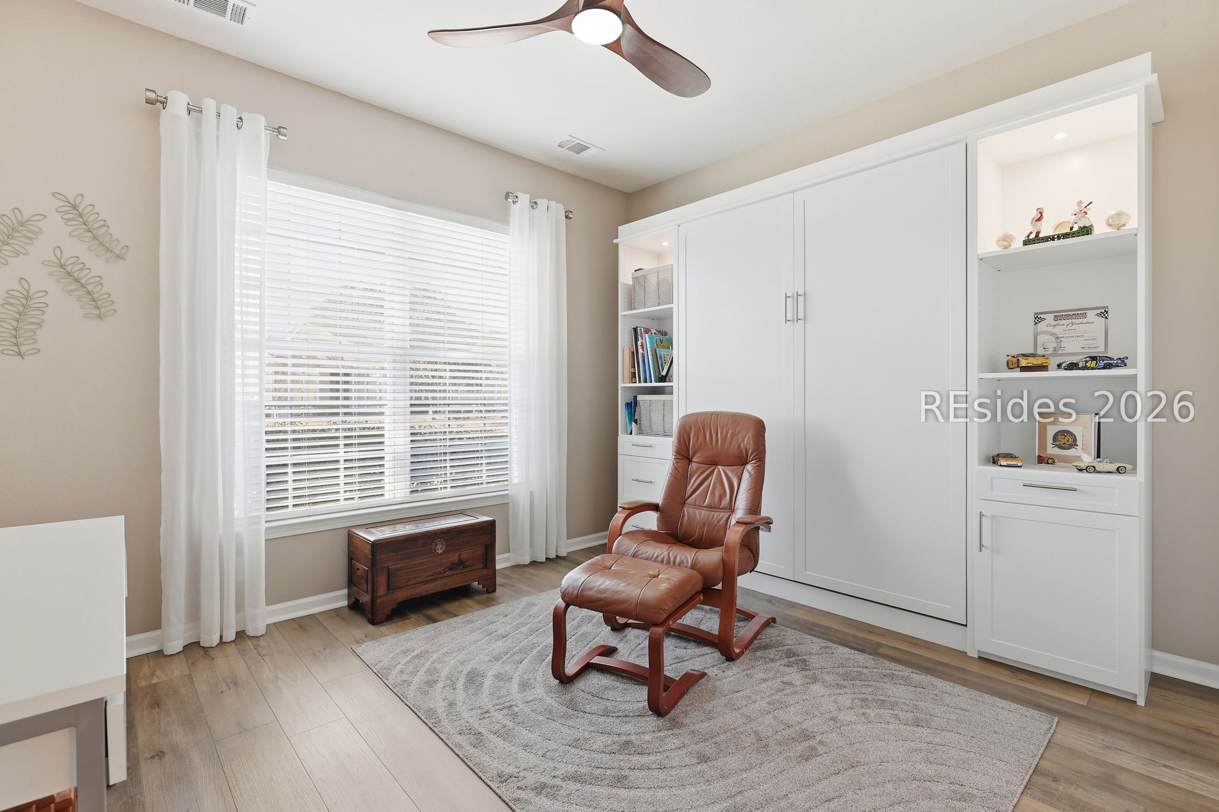 48 Seaford Place Bluffton, SC 29909 - Photo 23 of 37 Space saving Murphy Bed w/Shelves & Cabinets