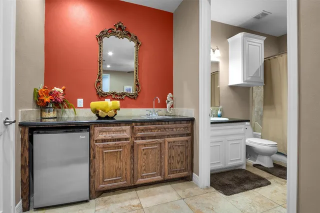 a bathroom with a sink and a toilet