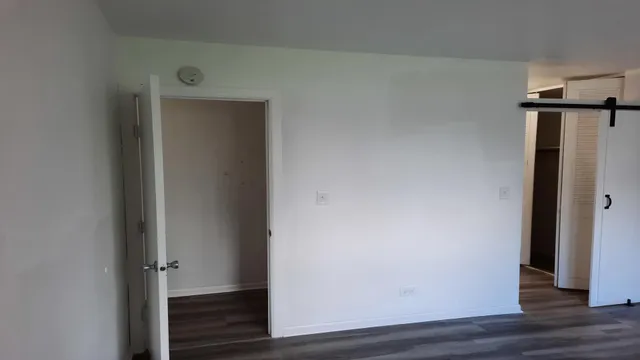 a view of front door with wooden floor